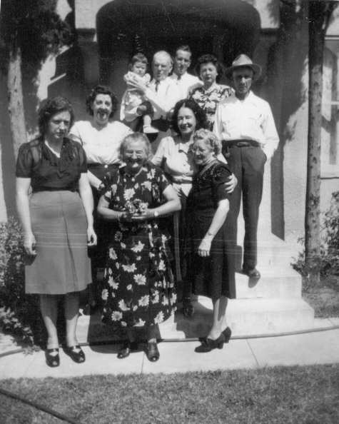 Front row (L-R): Louise Holmes, Mary (Holmes) Stevens, Unknown Lady; second row (L-R): Clara (Naylor) Holmes, Clara (Holmes) Henry; 3rd row (L-R): Daughter of Mary Frances (Holmes) Anthony, Joe Holmes, The husband of Mary Frances Holmes) Anthony, Mary Frances (Holmes) Anthony, Tom Stevens