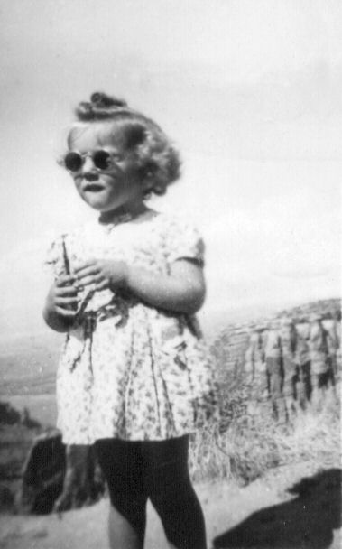 Karen Sue Sams with colored glasses on National Monument Drive