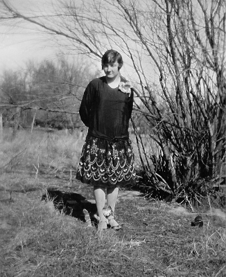 Charlotte Stevens & Kitty - dress black brite colored with embrodered flowers, a neighbor lady made it