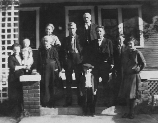 Mary (Holmes) Stevens, Betty Stevens, Emma (Layne) Stevens, Ella (Layne) Simpson, Tom Stevens, John W. Simpson, Bill Stevens, Walt Stevens, Don Stevens, Charlotte Stevens